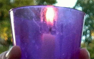 image of a candle burning. 