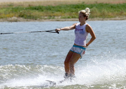 Claire Oslund, water ski team member, trick skiing.