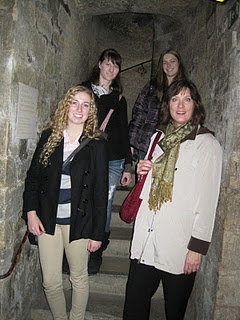Sharie Brunk, Amy McCubbins, Olivia Cody and Samantha Vanriper are pictured inside the Catacombs, a space below the city of Paris where bones from cemeteries were relocated in the 18th Century.