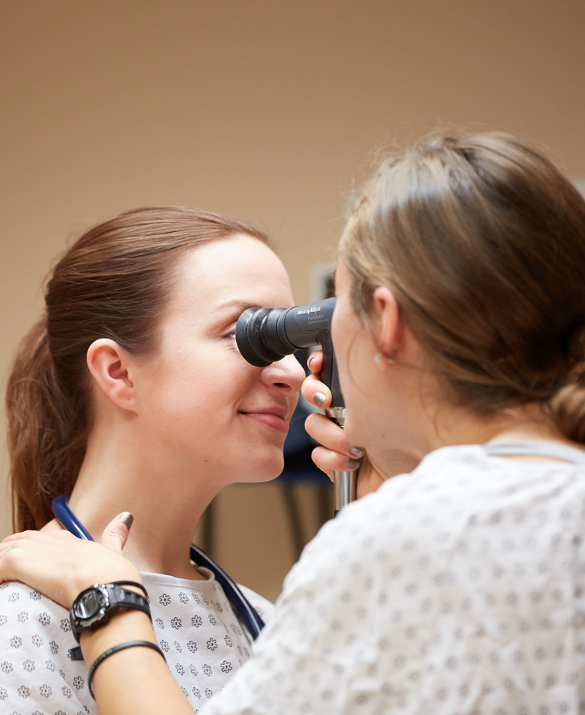 PA students practicing eye exam