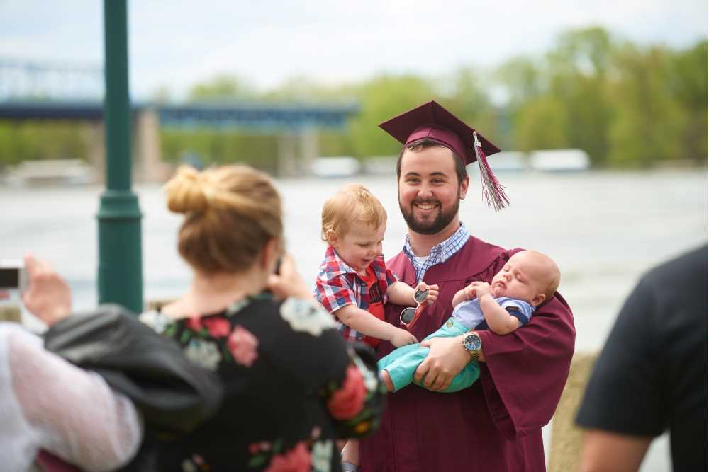 Graduate with babies
